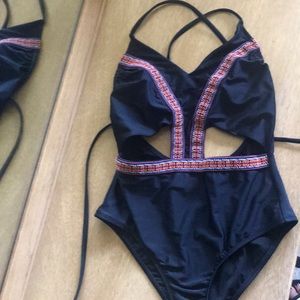 1 piece black swimsuit with colorful elastic trim